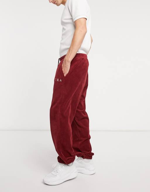 Puma Plus Cord sweatpants in burgundy exclusive to ASOS