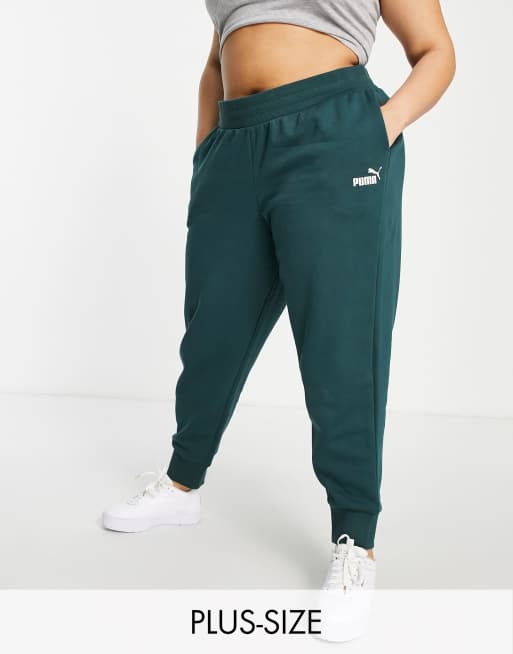 Puma Plus Essentials joggers in dark green