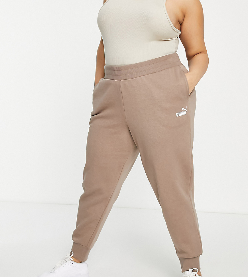 Plus-size joggers by PUMA Exclusive to ASOS Elasticated waist Side pockets PUMA logo print to thigh Ribbed cuffs Regular, tapered fit