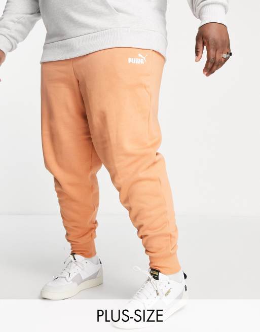 Puma Plus - Essentials - Joggingbroek in perzikkleur, exclusief bij ASOS