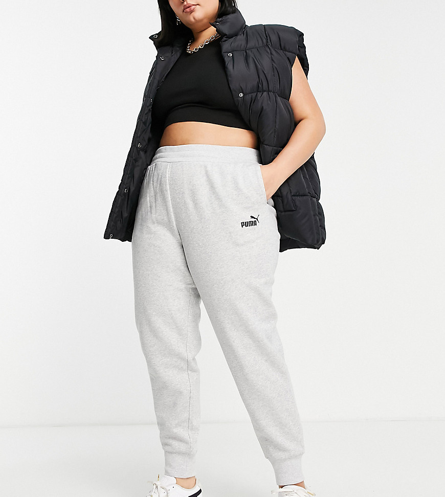 Plus-size joggers by PUMA Can%27t go wrong in sweats Elasticated waist Side pockets PUMA logo print Regular, tapered fit