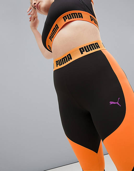 Puma Plus Exclusive To ASOS Paneled Legging In Black And Orange | ASOS