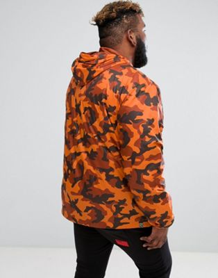 puma pullover windbreaker in camo print in orange exclusive to asos