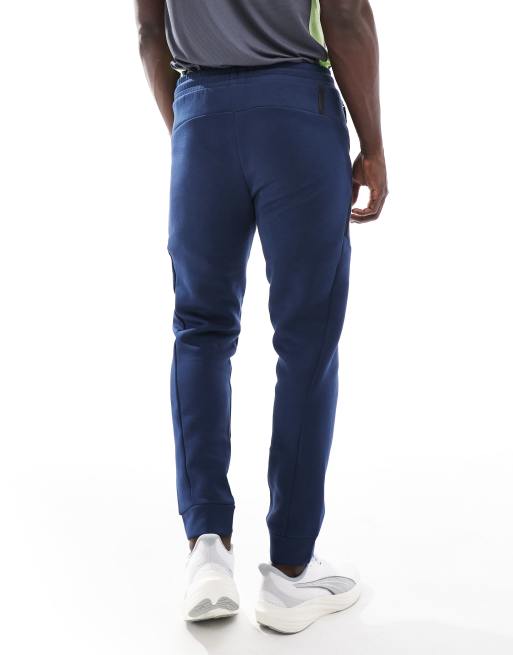 Puma Pumatech track pants in club navy