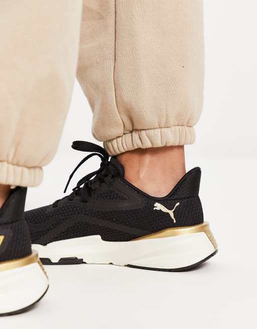PUMA PWRframe TR Deco Glam Sneakers nere e color oro