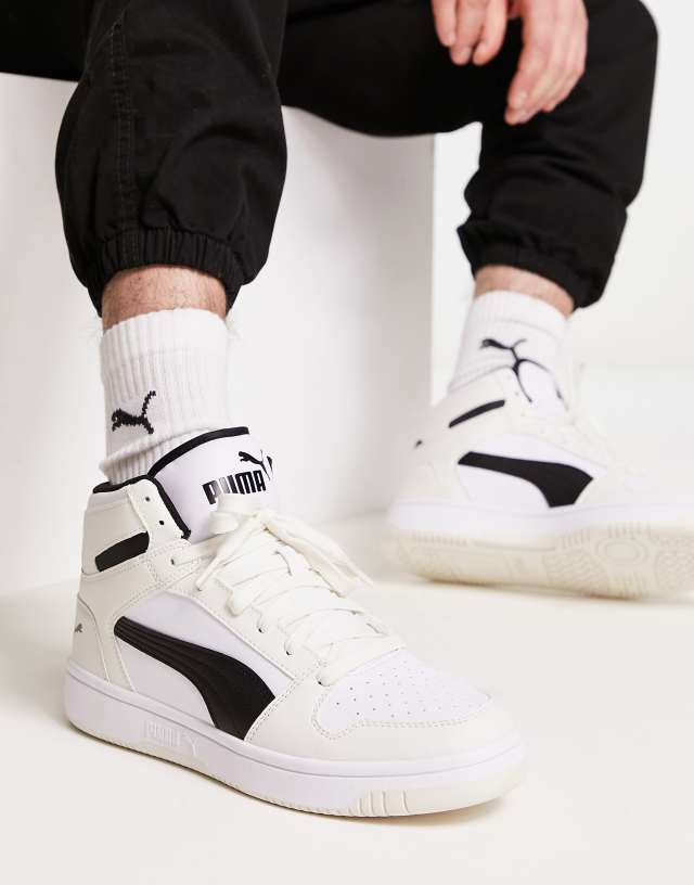 Puma Rebound Layup sneakers in white with black detail