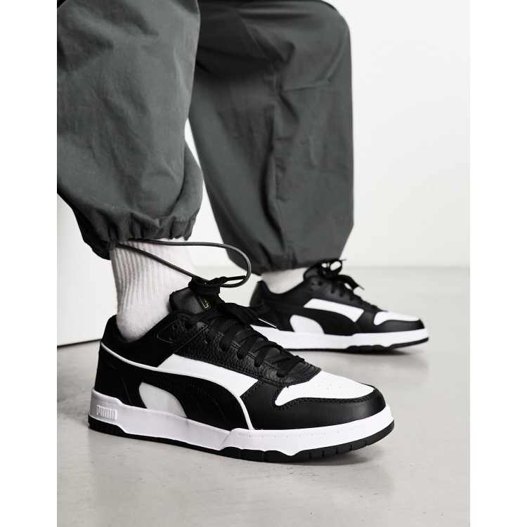 Puma black and white on sale sneakers