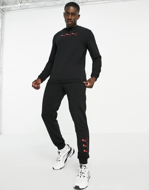 Puma repeat cat logo sweatshirt in black exclusive to ASOS