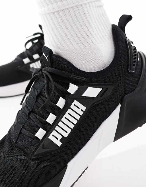 PUMA - Retaliate 3 - Sneakers nere e bianche, 4 di 5