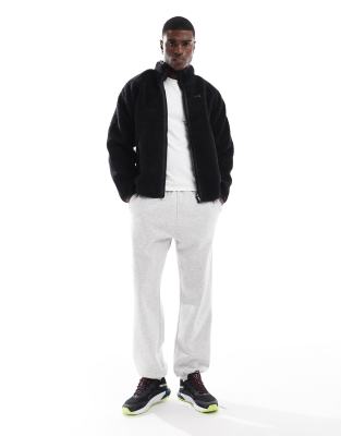 Puma Reversible sherpa jacket in puma black