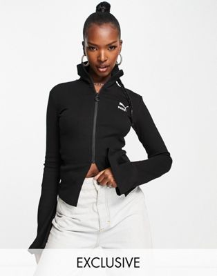 Puma ribbed high neck flare sleeve jacket in black - exclusive at ASOS