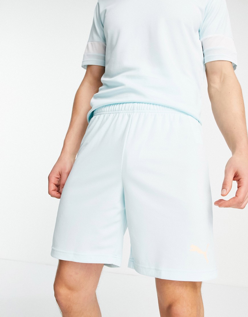 puma rise football shorts in baby blue and orange