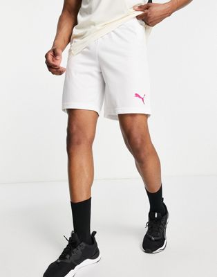 Puma Rise Football shorts in off white and pink