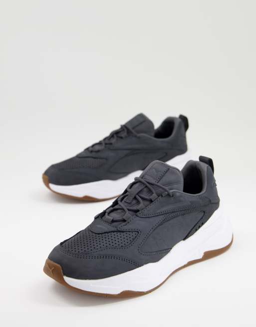 PUMA RS Fast premium sneakers in black with gum sole