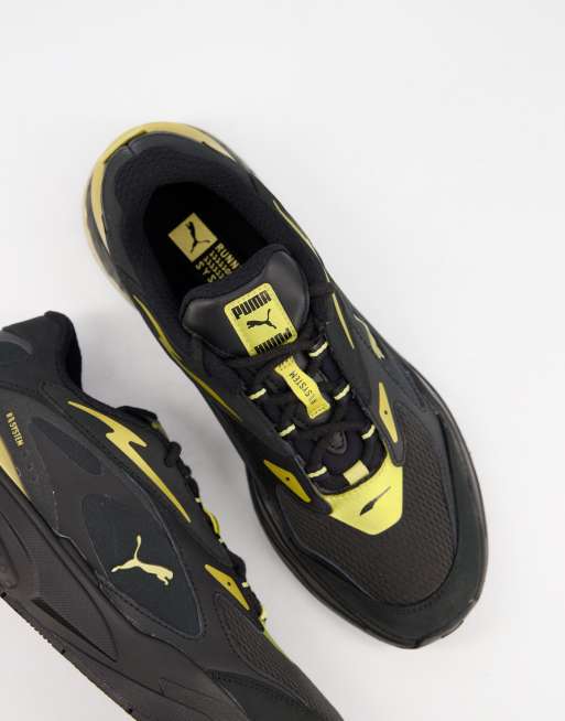 Puma RS Fast sneakers in black and gold