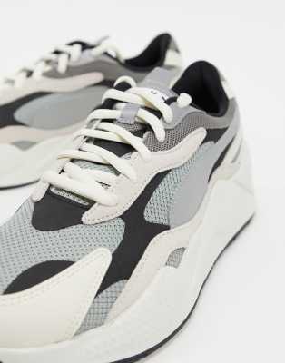 grey and white puma shoes