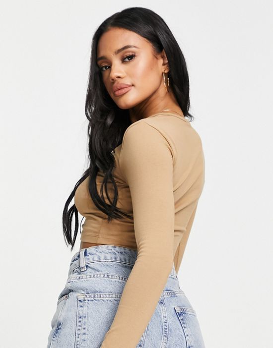https://images.asos-media.com/products/puma-ruched-front-long-sleeve-top-in-tan-exclusive-to-asos/201848571-3?$n_550w$&wid=550&fit=constrain