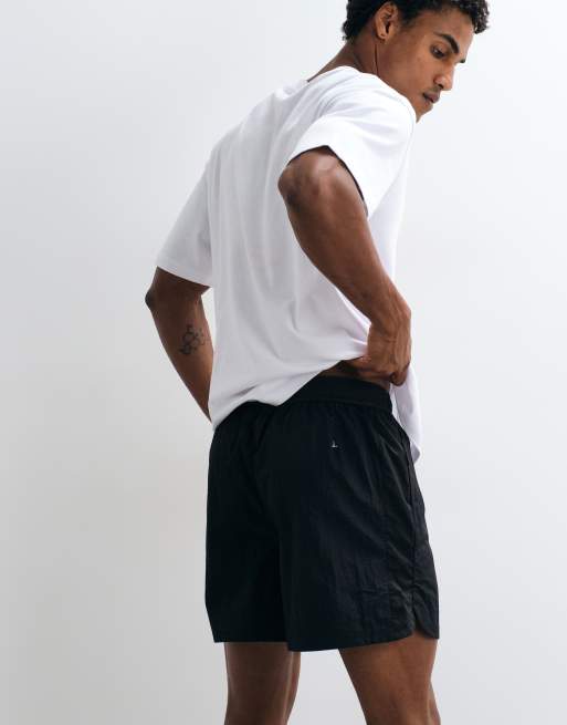 Puma Run culture collective t7 relaxed 5'' woven shorts in black, 5 of 5