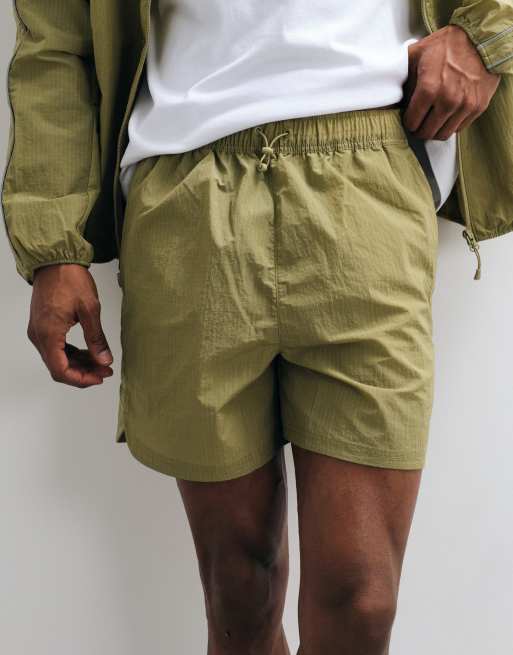 Puma Run culture collective t7 relaxed 5'' woven shorts in brown, 2 of 5