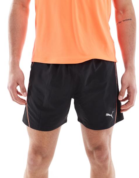 Puma Run Velocity shorts in black with orange piping