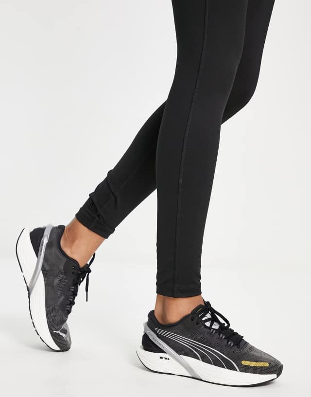 Puma Run XX Nitro sneakers in black and white