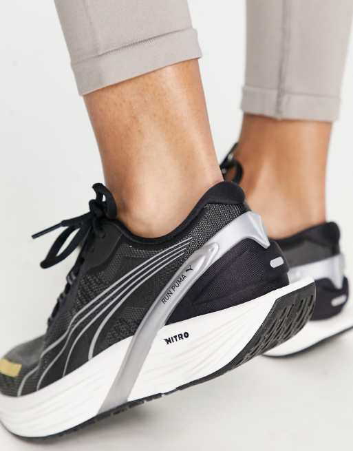 Puma nere hot sale e oro