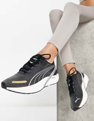 Puma Run XX Nitro trainers in black and gold