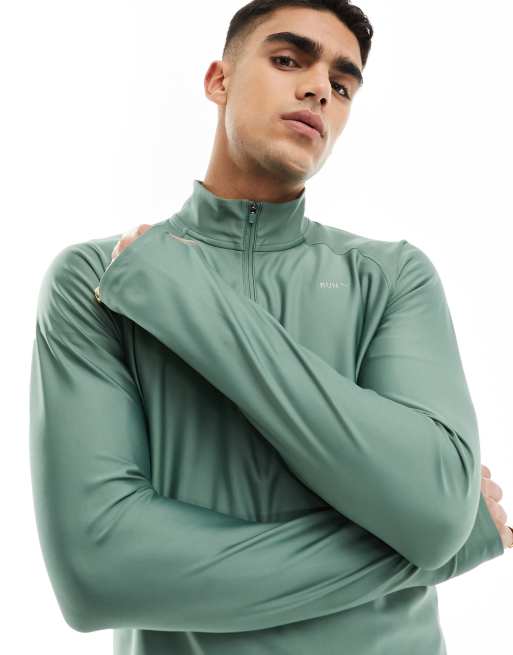 PUMA Running Evolve 1/4 zip sweatshirt in light green