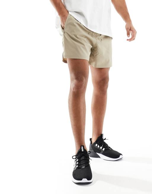 Puma track store shorts brown