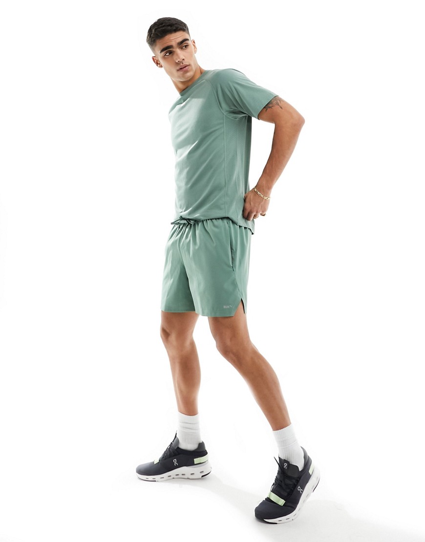 Puma Running Evolve 5 inch woven shorts in light green