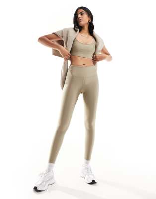 PUMA Running Evolve leggings in brown