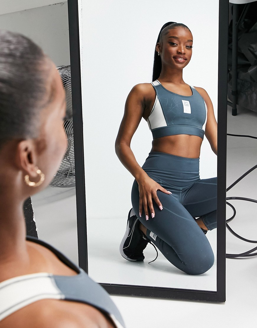 Puma Running First Mile high support sports bra in blue and stone
