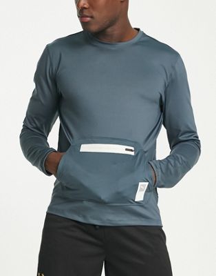 Puma Running First Mile midlayer top with pocket detail in blue and cream