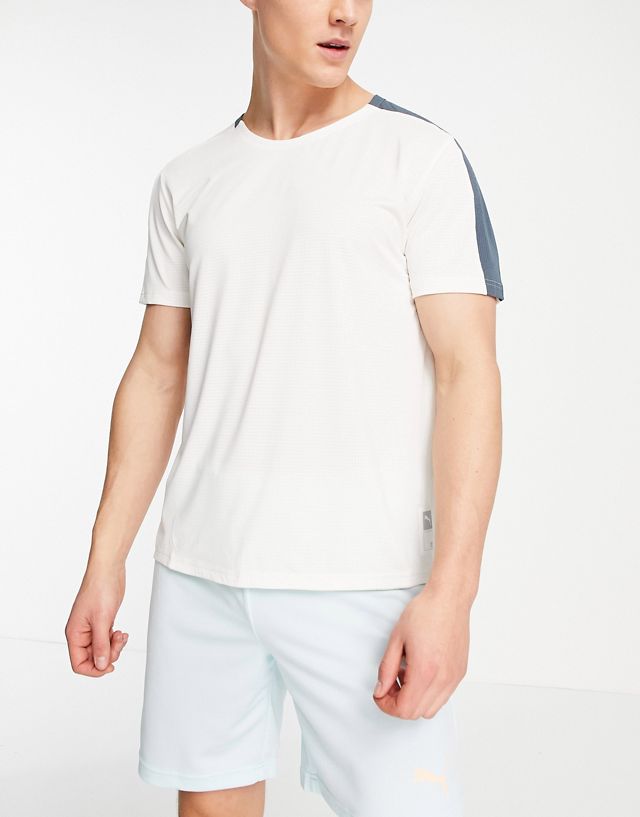 Puma Running First Mile short sleeve t-shirt in blue and cream