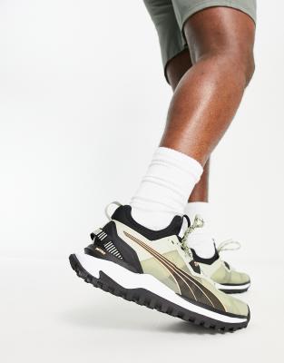 Puma Running Voyage Nitro trainers in khaki and black