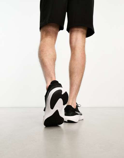 Puma Scend trainers in black & white, 2 of 4