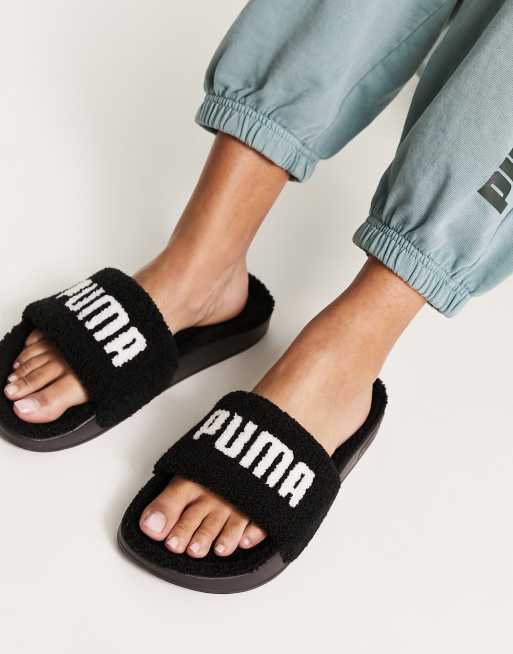 PUMA Sherpa leadcat slides in black ASOS