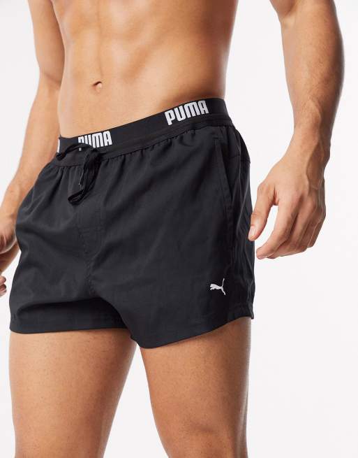 Puma short length logo waist band swim shorts in black