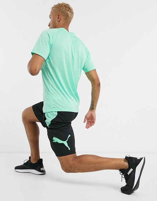 Puma shorts in black and mint green
