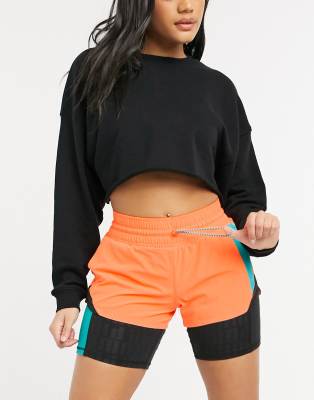 PUMA shorts in orange