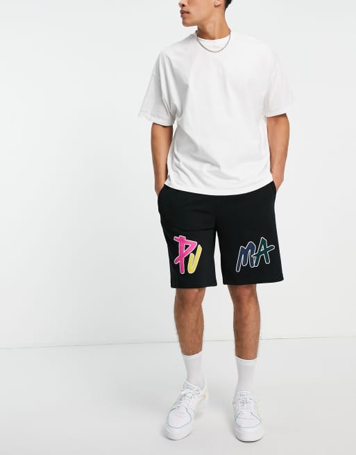 Puma - Skate - Sorte shorts med multifarvede detaljer i firkantet pasform 