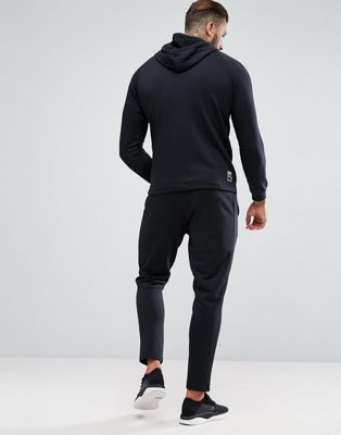 puma skinny fit tracksuit set in black
