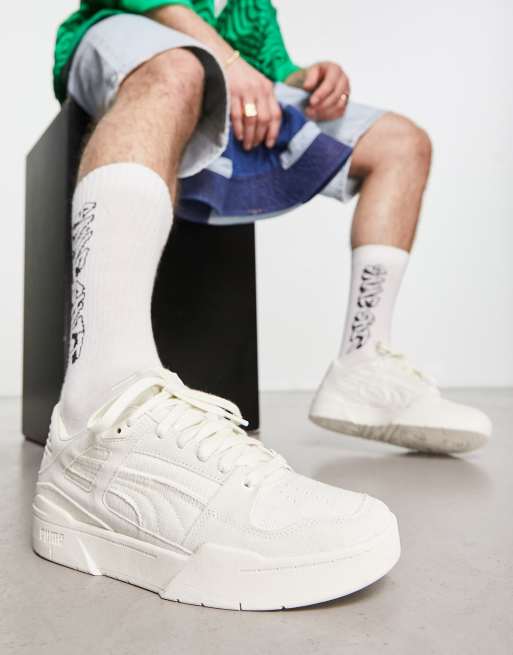 Puma white deals canvas sneakers