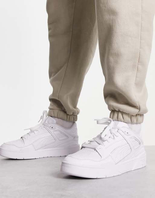 Puma white leather store trainers