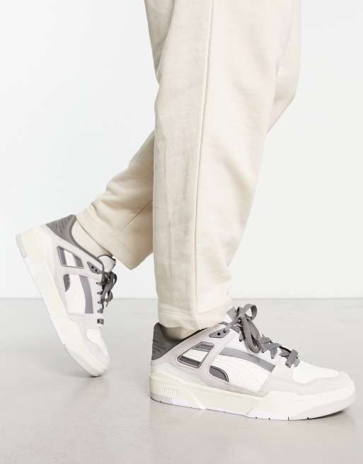 PUMA – Slipstream – Vita och grålila sneakers