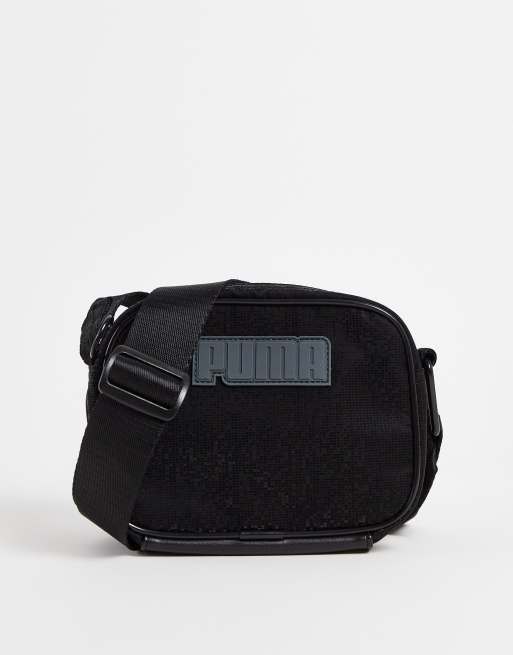 Puma small cross body bag in black ASOS