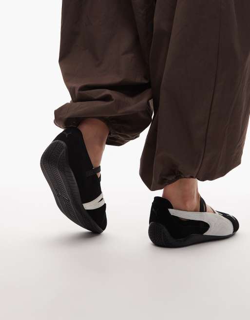 Puma Speedcat ballet flats in black and white