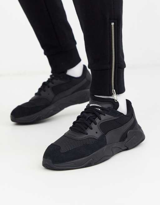 Puma Storm Origin sneakers in black