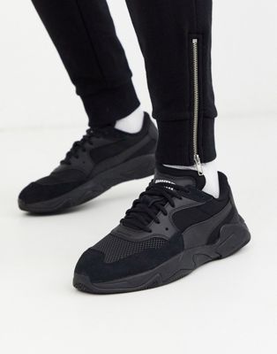 Puma - Storm Origin - Sneakers in zwart 