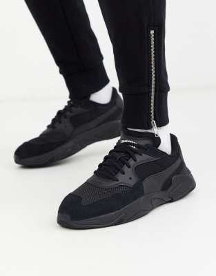 Puma Storm Origin trainers in black | ASOS